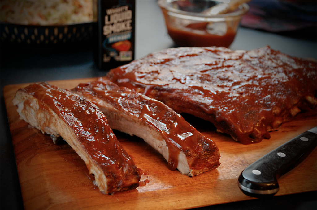 Learn how to use Wright's Liquid Smoke on ribs with this smoky oven BBQ ribs recipe. Perfect for any occasion, these ribs are sure to be a hit!